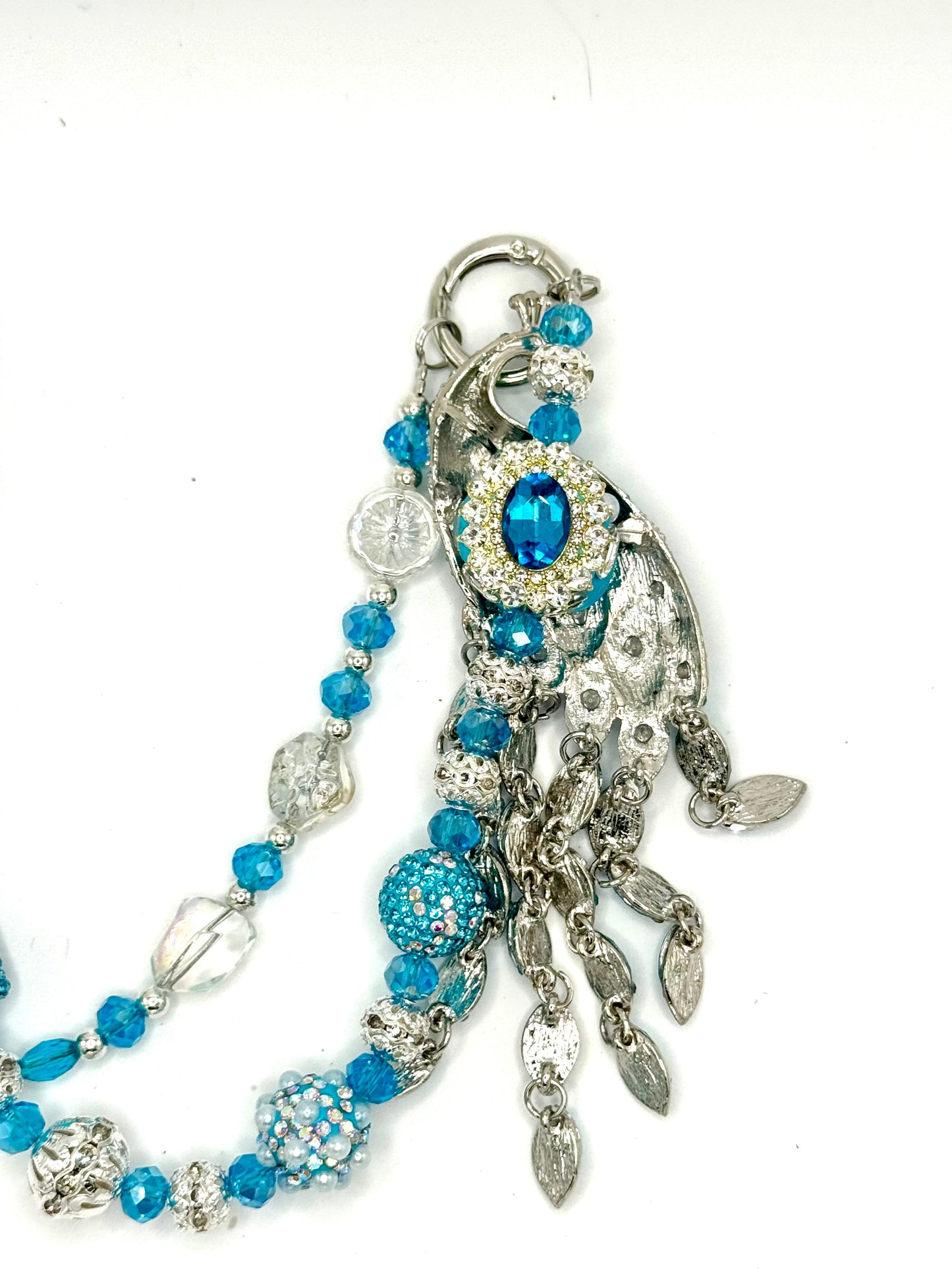 Blue peacock tassel charmed phone clip & chain