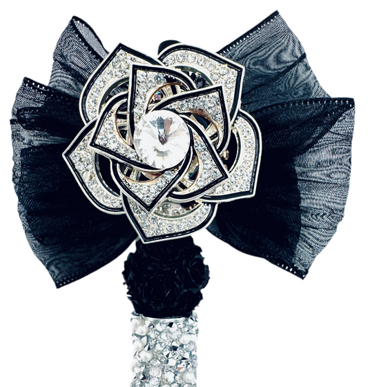Elegant black bow with silver spinner, charmed pen.
