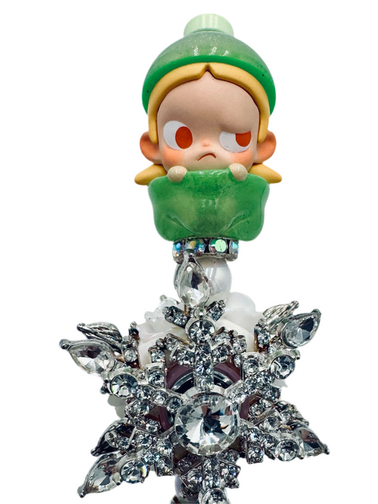 Cute green baby with silver color spinner, charmed pen.