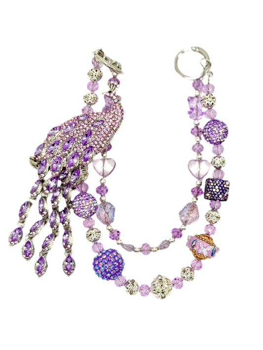 Purple peacock charmed phone chain.