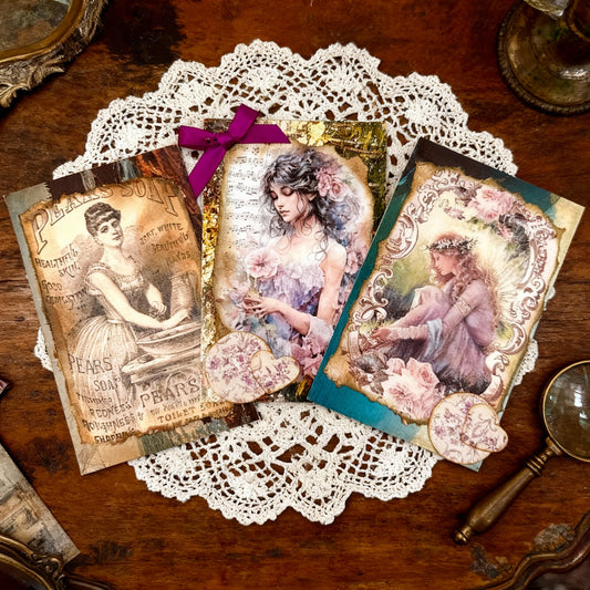 Set of 3 Altered vintage postcards.